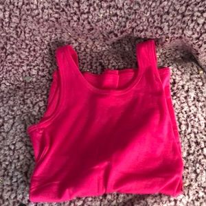 Pink tank top.